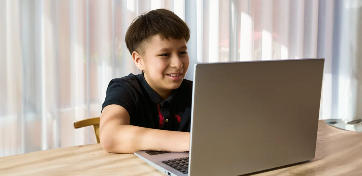 Student attending to an online class at home