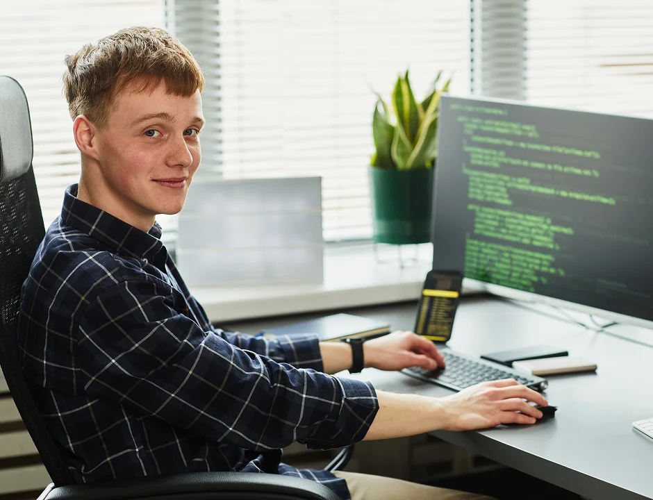 Student working with his computer