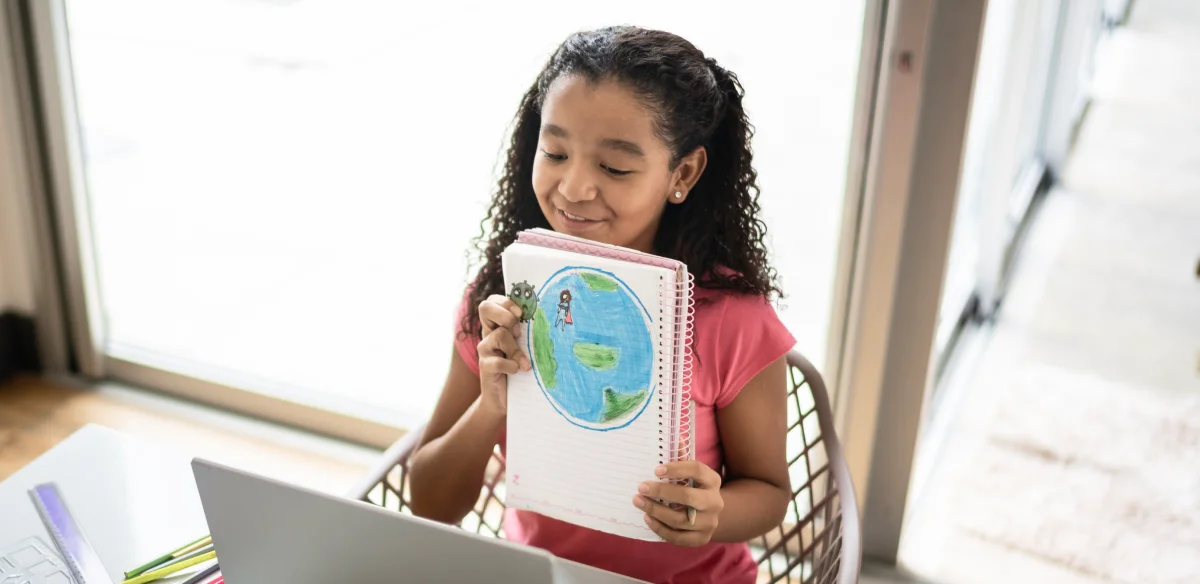 Student showing a draw to her class